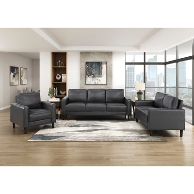 Fauteuil de style industriel 3 pièces gris foncé en similicuir rembourré, rembourré de mousse et rembourré de mousse au-dessus des ressorts ensachés.