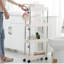Chariot de rangement roulant, étagère mobile mince à 4 niveaux pour le rangement, chariot utilitaire verrouillable à roues pivotantes à 360 °, idéal pour le bureau, la cuisine, la salle de bain, la buanderie ou les espaces étroits, blanc