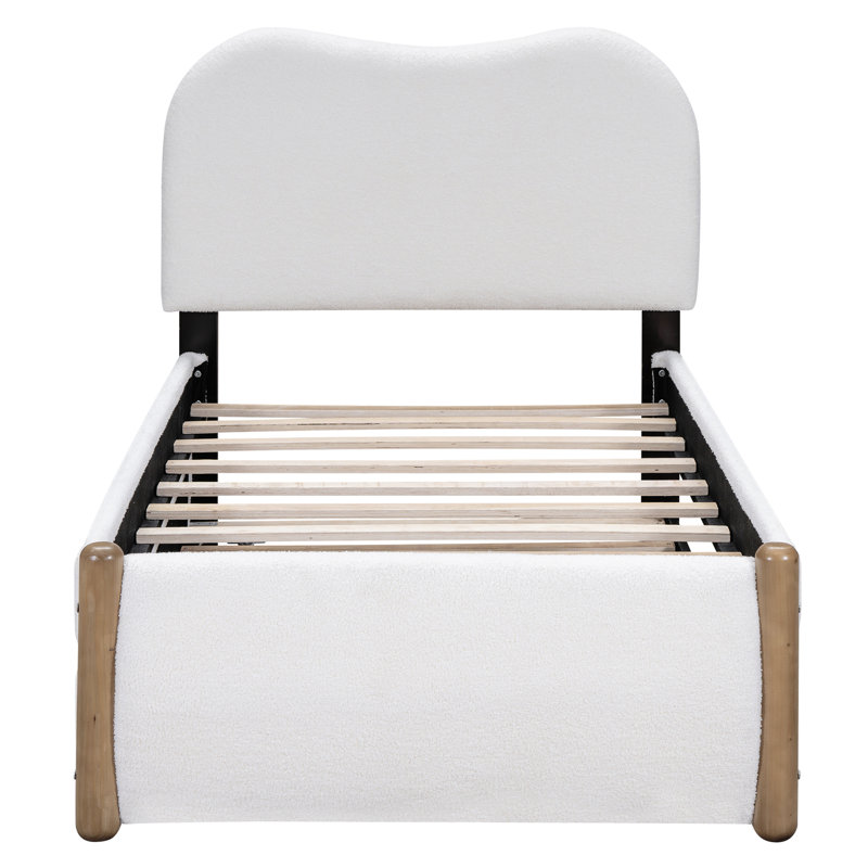Lit plateforme tapissier confortable avec pieds de soutien en bois et lit gigogne pratique, idéal pour les invités et le décor de la chambre à coucher