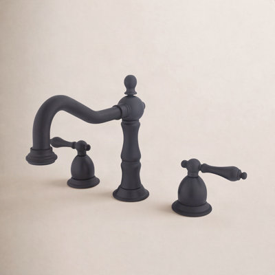 Kingston Brass Heritage Two-Handle 3-Hole Deck Mount Widespread Bathroom Faucet with Brass Pop-Up Drain