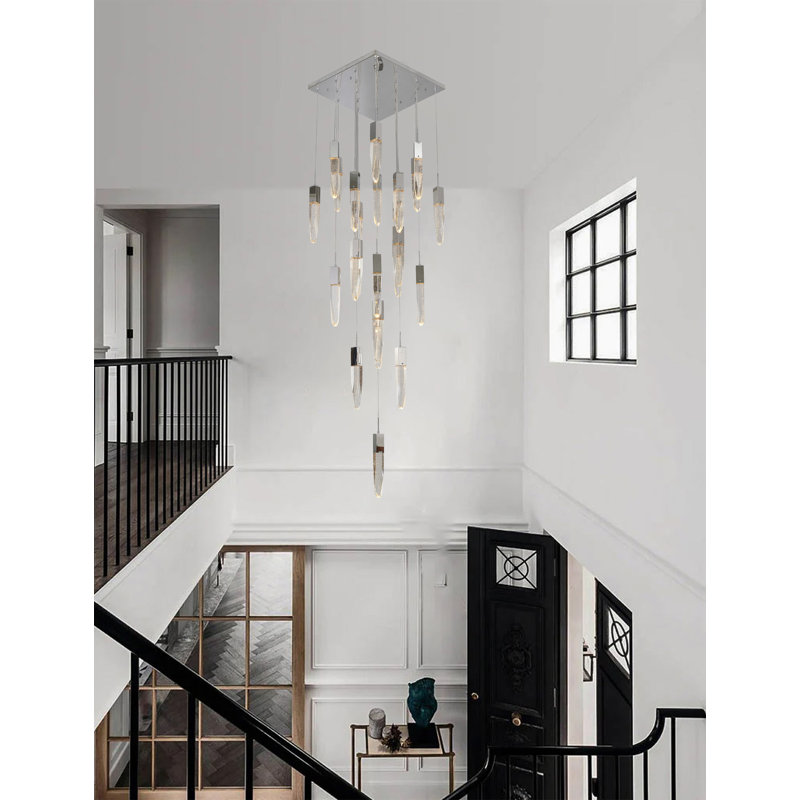 This Exquisite Chandelier Is In A Gold Finish. The Frame Is Made Out Of Metal, And It Comes With Hanging Clear Iceberg Bubble Crystals. You Can Create A Timeless Feel While Using Modern Forms.