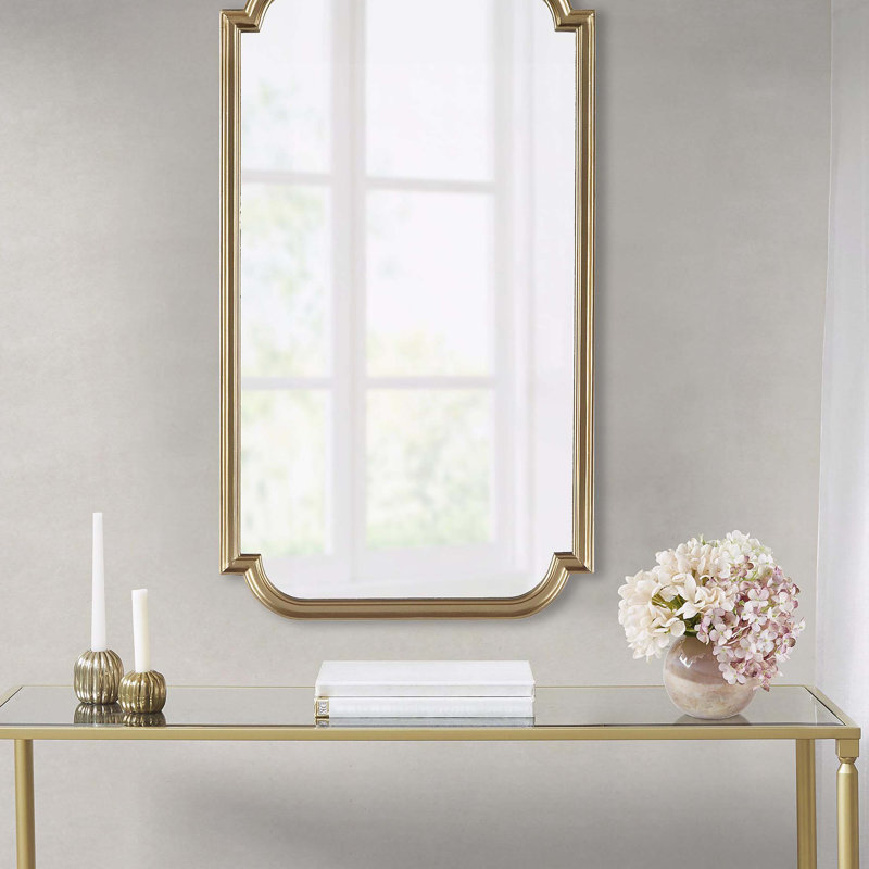 Miroir mural doré