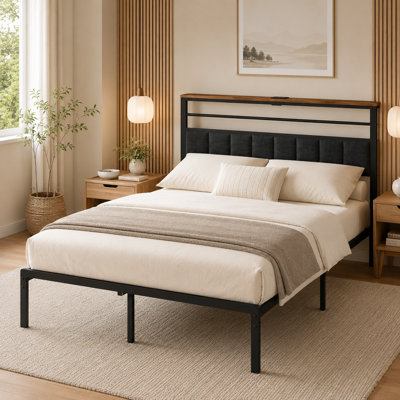 Black upholstered metal full-size bed frame with storage and charging dock at the headboard; sturdy structure eliminates the need for a spring mattress.