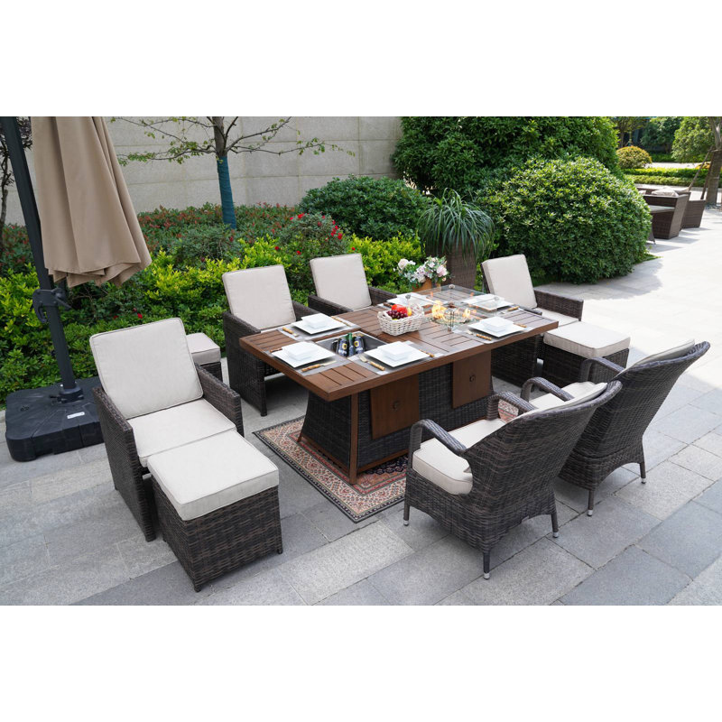 Aquiel 10 - Person Wicker Patio Dining Set with Rectangular Table , Cushions Included