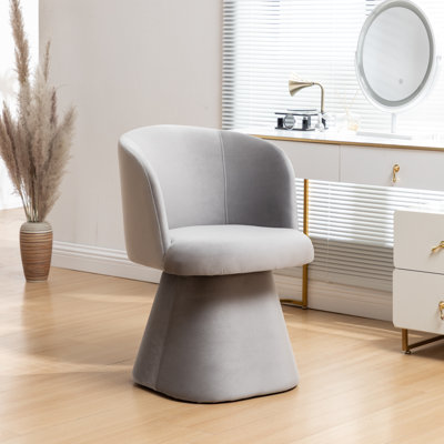 Chaise rembourrée pivotante en velours Dantzler