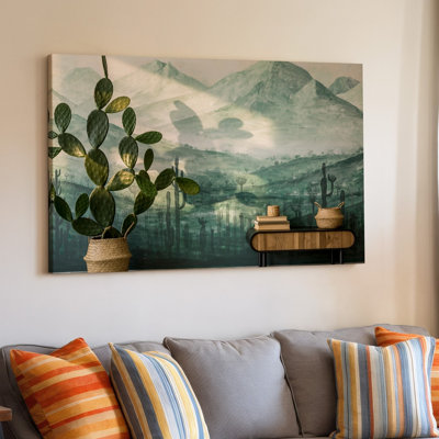 Toile, une scène intérieure sereine avec une grande murale texturée représentant un paysage désertique avec des montagnes et des cactus sur toile