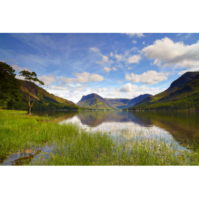 Sunshine Over Buttermere by Simonbradfield - Wrapped Canvas Print