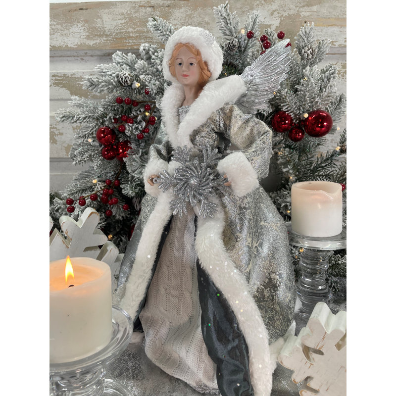 Ange hivernal avec flocon de neige blanc argenté
