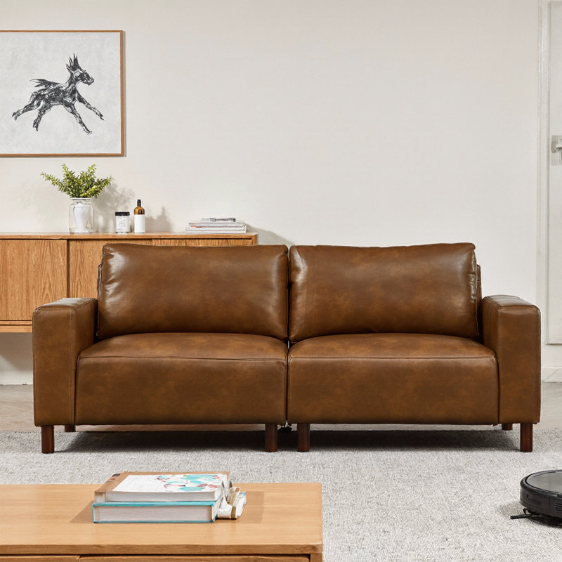 Courbes de style Mid-Century, cuir de polyuréthane respirant, pieds en bois massif, assemblage sans outils en 30 minutes, luxe adapté aux appartements