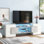 Meuble télé unique de forme unique avec 2 tablettes en verre illuminées, centre de divertissement ultrabrillant pour téléviseurs jusqu'à 88 po, meuble télé polyvalent avec lumières à DEL changeant de couleur pour le salon