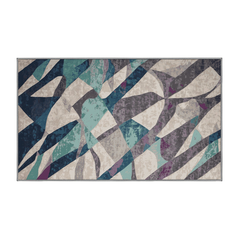 Tapis gris soyeux et moelleux