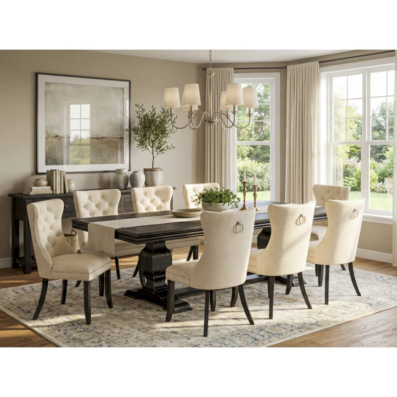 9-piece dining set consists of a wooden table and 8 Light Beige Polyester fabric dining chairs with Button Tufted Chair Back - Sand Blasting Black Finish.