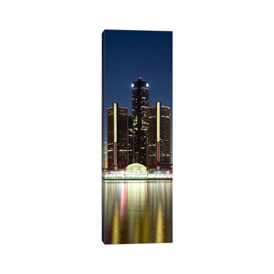 Skyscrapers Lit Up At Dusk, Renaissance Center, Detroit River, Detroit, Michigan, USA by Panoramic Images - Wrapped Canvas Panoramic Print