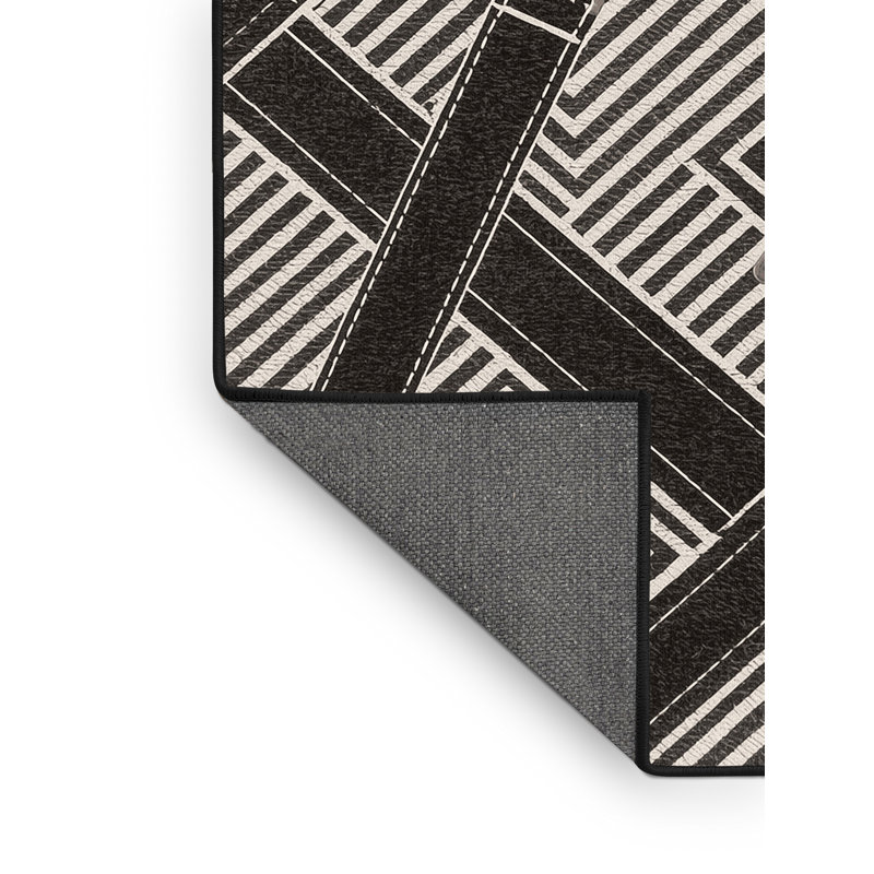 Tapis à rayures douces et moelleuses en noir Elwell, 8 x 12