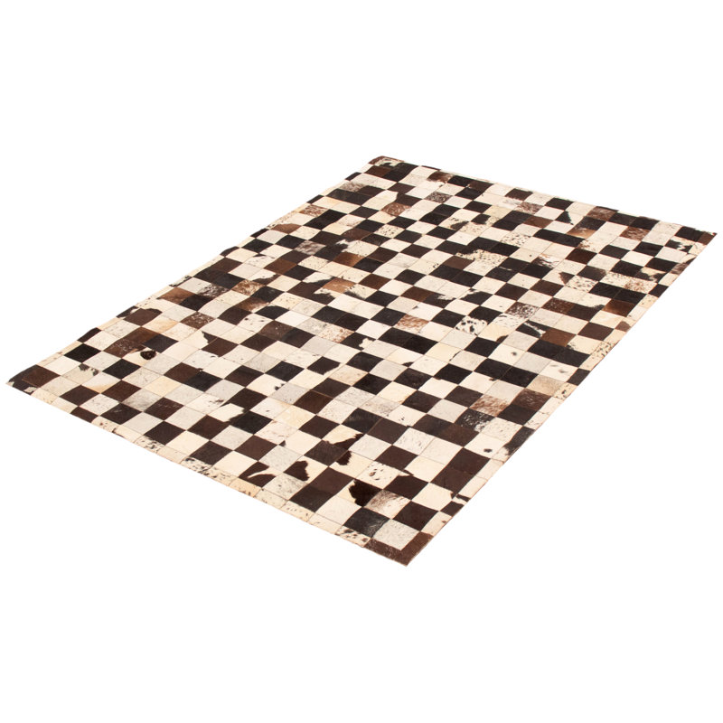 Tapis noir / brun / beige en peau de vache à carreaux Niangua