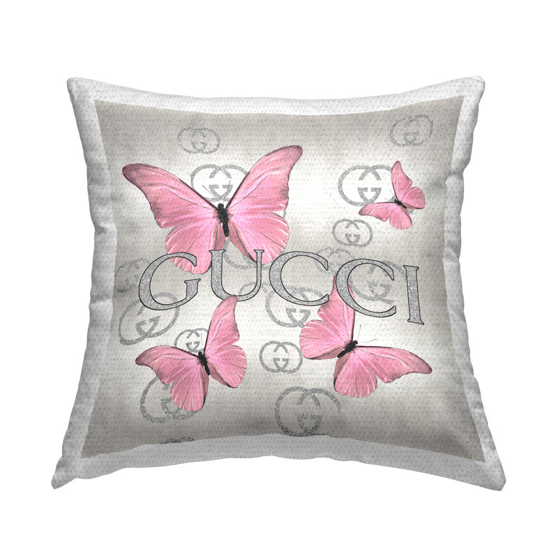 Coussin d'extérieur imprimé à papillons roses Glam Stupell Industries par Madeline Blake