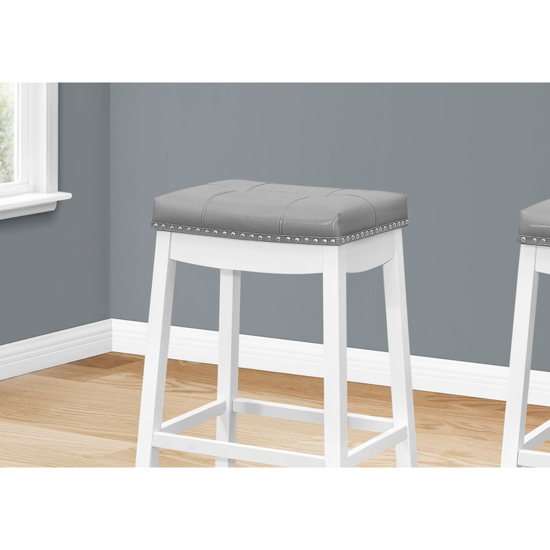 Ensemble de deux chaises de bar sans dossier en similicuir gris et blanc avec repose-pieds
