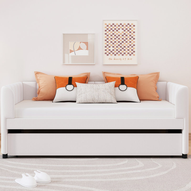 Lit de jour simple rembourré beige avec tissu de rangement extensible, portatif, pliable et ergonomique pour une nuit de détente