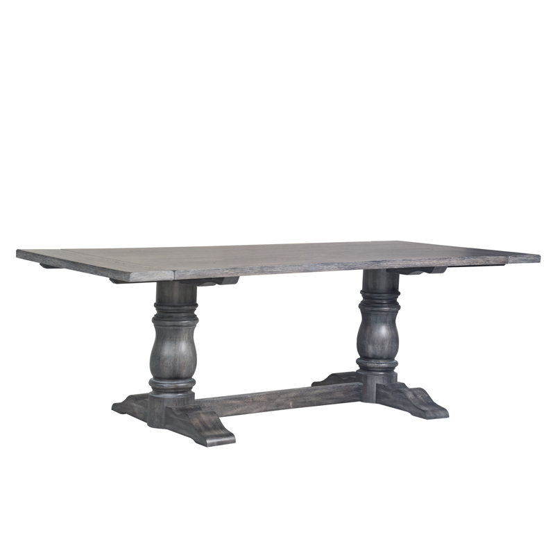 Table de salle à manger grise patinée avec plateau rectangulaire en bois massif et pieds doubles en bois