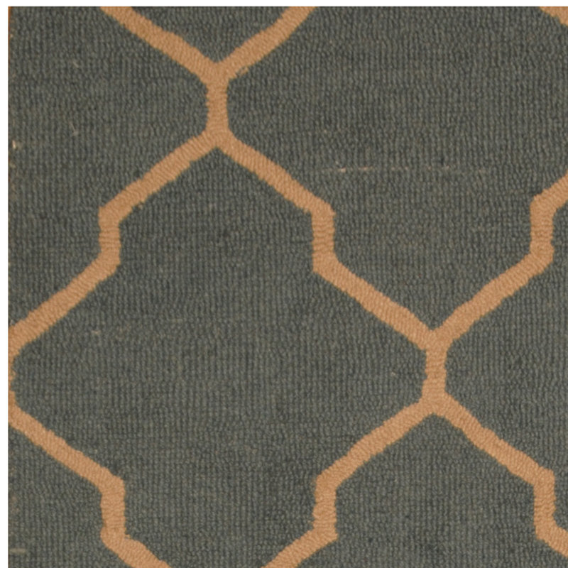 Tapis gris foncé / orange touffeté à la main