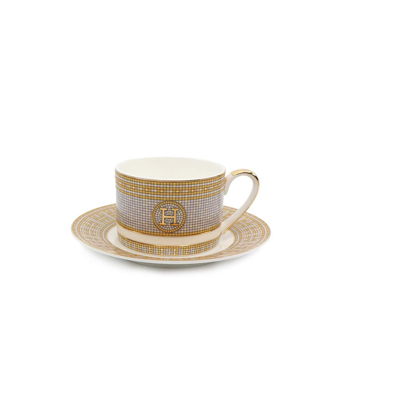 Ensemble de tasse à thé et soucoupe en porcelaine tendre