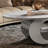 49.2" Oval Coffee Table with Faux Marble Top, Silver Stainless Steel Base with Abstract Fantastic Midsize Sphere Crescent-Shaped Design-1678648413
