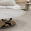 Table basse en marbre avec base sculpturale en acier inoxydable