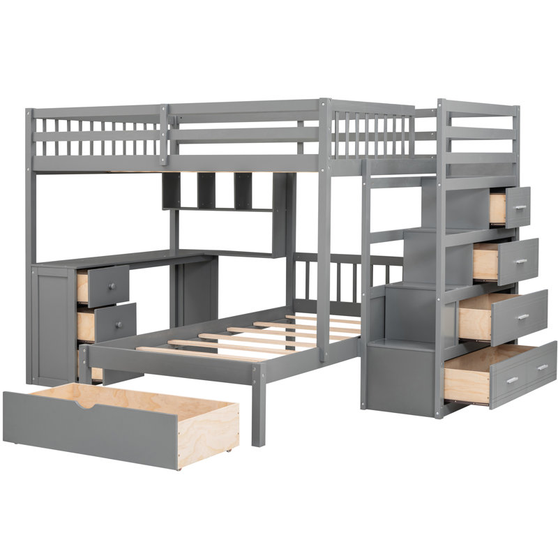 Lit double superposé au-dessus d'un lit simple gris avec bureau et espaces de rangement efficaces