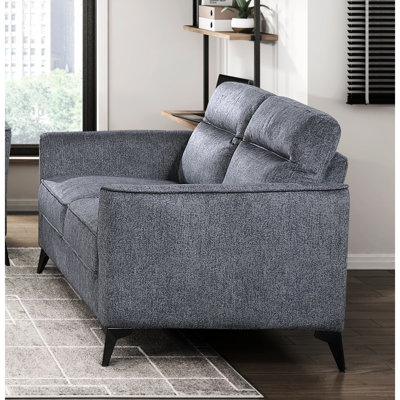 Ensemble de 3 pièces en microfibre gris foncé avec assise confortable et supports en métal. Consortia moderne de 3 pièces: dans des pieds coussinés texturés pour une ambiance familiale