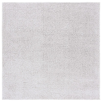 Tapis de couleur unie à poils longs Lindsay