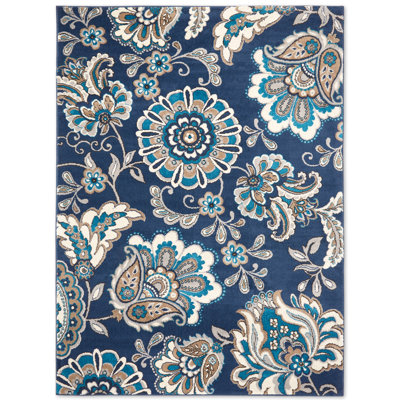Tapis bleu à motif floral Caffey