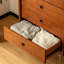 Commode d'appoint arrondie avec pattes en acier inoxydable