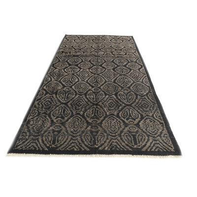 Iniguez Black Rug