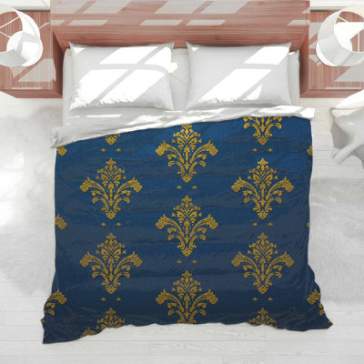 Édredon doré à motif damassé