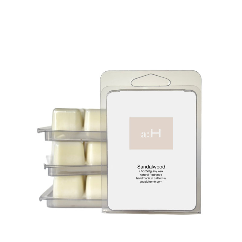 A: H Bougie en bois de santal