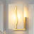 1-Light Armed Wall Sconce Gold Accent with White Faux Marble Pattern