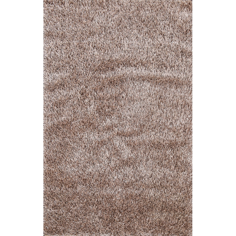 Tapis beige touffeté à la main