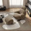 Chaise berçante moderne avec repose-pieds