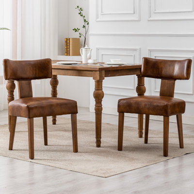 Ensemble de 2 chaises de salle à manger de style Mid-Century moderne en cuir de polyuréthane rembourré avec dossier incurvé et structure en bois franc