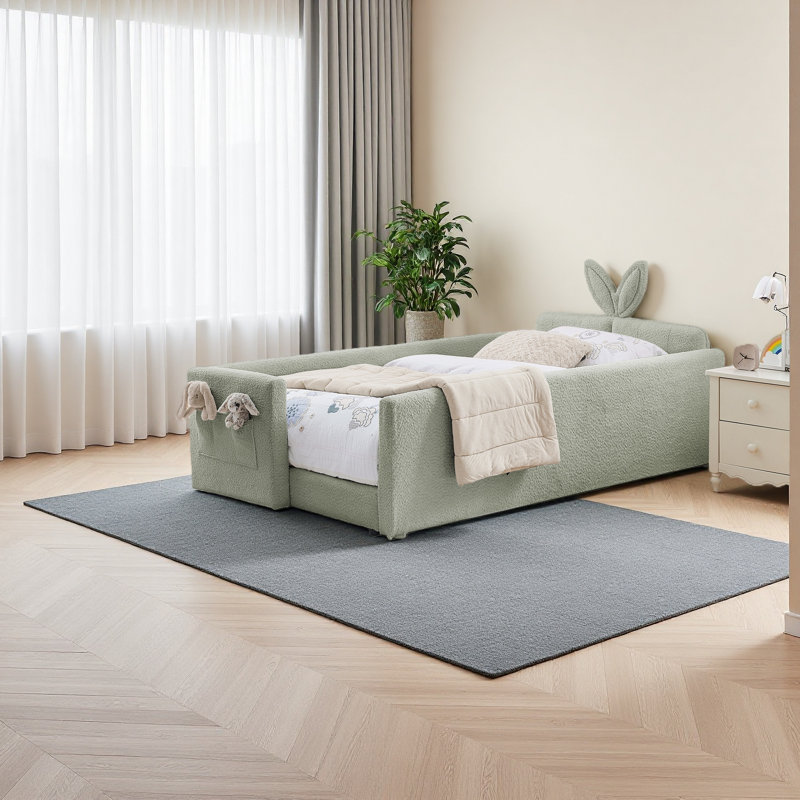 Lit plateforme tapissier simple avec tête de lit mignonne en forme d'oreille de lapin, avec barre de sécurité et poche, tissu bouclé