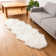 Tapis blanc moelleux en fausse peau de mouton