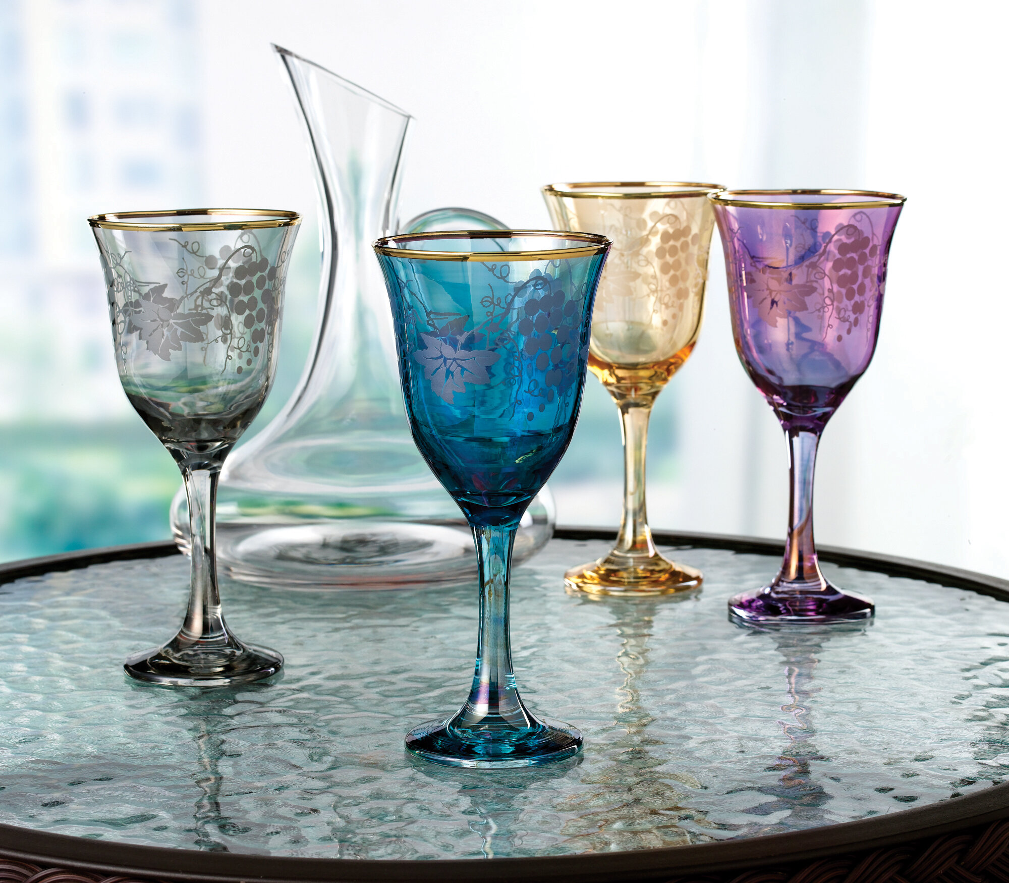 https://assets.wfcdn.com/im/79075047/compr-r85/1132/113271002/lorren-home-trends-4-piece-9oz-glass-all-purpose-wine-glass-glassware-set.jpg
