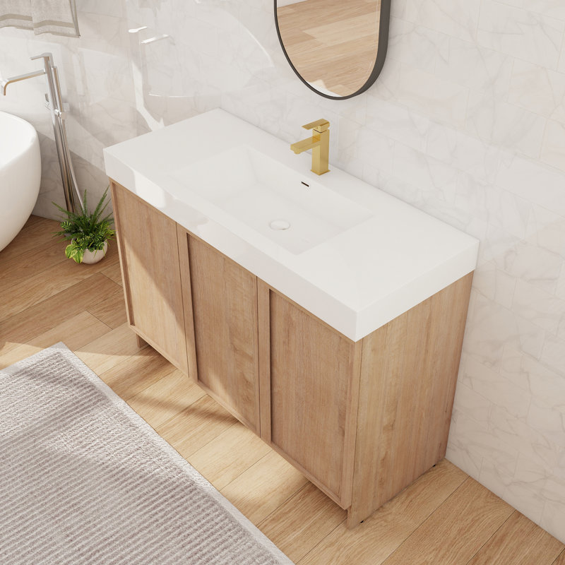 Meuble-lavabo autoportant de 122 cm (48 po) avec lavabo à bords épais en résine et armoire de rangement à 3 portes et 2 étagères en chêne imitation.