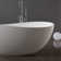 62.99'' X 37.4'' Freestanding Soaking Solid Surface Bathtub With Pop-up Drain And Overflow