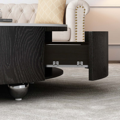 Table basse ronde en pierre frittée avec deux tiroirs et base en placage noir durable pour le rangement de salon moderne.