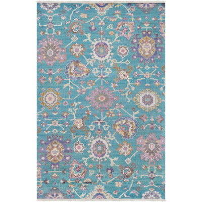Tapis bleu sarcelle / mauve à motif floral Daison