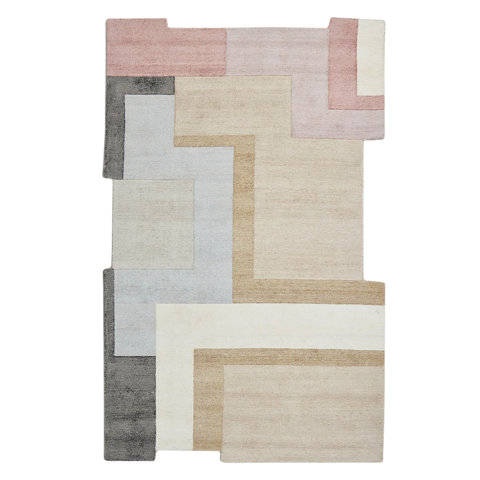 Abstract area rug in pink, gray, and beige.
