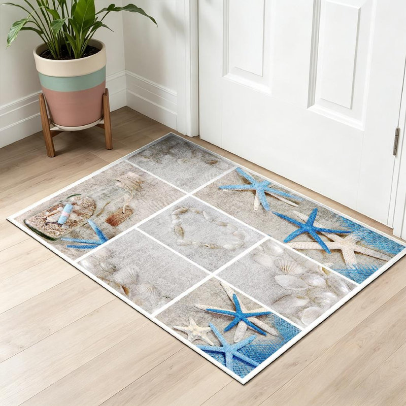 Tapis d'intérieur bleu à motif de coquillages bleus