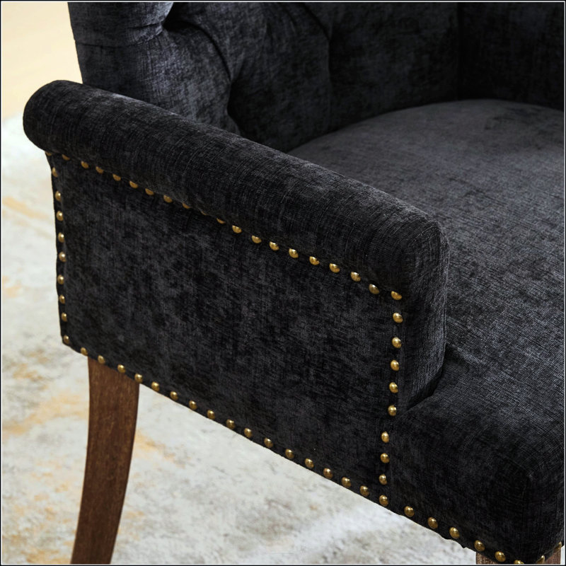 Élégante chaise de salle à manger rembourrée en chenille avec des pieds incurvés en bois massif, parfaite pour le confort et le style dans toute salle à manger.