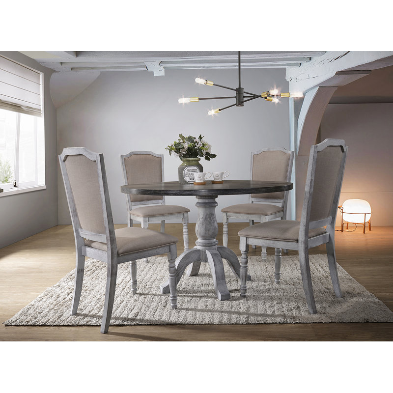 Ensemble de cinq tables de salle à manger pour les salles à manger compactes, idéales pour les maisons modernes avec des caractéristiques d'économie d'espace et de confort.
